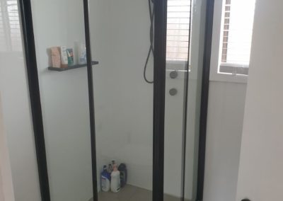Corner sliding door shower in black installed in Edwardstown